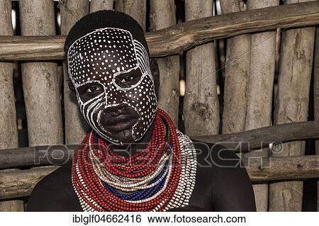 Young woman with painted face, portrait Karo tribe, Southern Nations Nationalities and Peoples' Region, Ethiopia, Africa View Large Photo Image Stock Photograph - Young woman with painted face, portrait Karo tribe, Southern Nations Nationalities and Peoples' Region, Ethiopia, Africa. Fotosearch