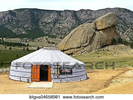Stock Image - Yurt in front of the rock formation turtle, Melkhii Khad, Gorchi-Tereldsch National Park, Tereldsch, Mongolia, Asia. Fotosearch