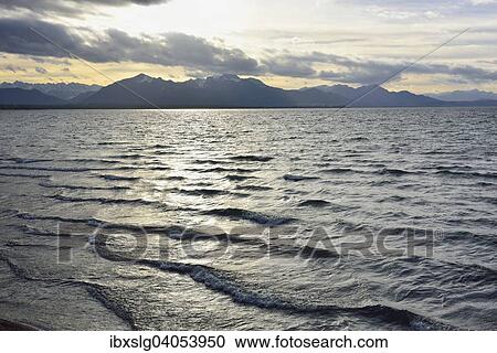Abendrot am Chiemsee, Silhouette Chiemgauer Alpen, bei Chieming, Voralpenland, Chiemgau, Bayern, Deutschland, Europa View Large Photo Image Stock Image - Abendrot am Chiemsee, Silhouette Chiemgauer Alpen, bei Chieming, Voralpenland, Chiemgau, Bayern, Deutschland, Europa. Fotosearch