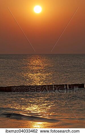 Abendsonne an der Ostsee, vorne Buhne, Ahrenshoop, Darss, Mecklenburg-Vorpommern, Deutschland, Europa View Large Photo Image Stock Image - Abendsonne an der Ostsee, vorne Buhne, Ahrenshoop, Darss, Mecklenburg-Vorpommern, Deutschland, Europa. Fotosearch