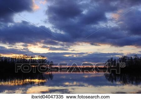 Stock Photography - Abendstimmung am See, Alpen-Menzelen, Nordrhein-Westfalen, Deutschland, Europa. Fotosearch