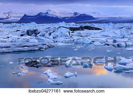 Abendstimmung an der Gletscherlagune Jokulsarlon, treibende Eisberge, hinten der Gletscher Vatnajokull, Sudisland, Island, Europa View Large Photo Image Stock Image - Abendstimmung an der Gletscherlagune Jokulsarlon, treibende Eisberge, hinten der Gletscher Vatnajokull, Sudisland, Island, Europa. Fotosearch