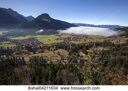 Ausblick in das Ostrachtal, links Bad Oberdorf, Mitte Imberger Horn, rechts Bad Hindelang mit Nebel, Allgau, Bayern, Deutschland, Europa View Large Photo Image Picture - Ausblick in das Ostrachtal, links Bad Oberdorf, Mitte Imberger Horn, rechts Bad Hindelang mit Nebel, Allgau, Bayern, Deutschland, Europa. Fotosearch