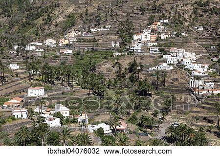 Ausblick vom Mirador Cesar Manrique auf Terrassenfelder und Hauser von La Vizcaina, Valle Gran Rey, La Gomera, Kanarische Inseln, Spanien, Europa View Large Photo Image Stock Image - Ausblick vom Mirador Cesar Manrique auf Terrassenfelder und Hauser von La Vizcaina, Valle Gran Rey, La Gomera, Kanarische Inseln, Spanien, Europa. Fotosearch