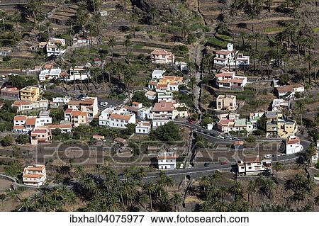 Ausblick vom Mirador Cesar Manrique auf Terrassenfelder und Hauser von Los Reyes, Valle Gran Rey, La Gomera, Kanarische Inseln, Spanien, Europa View Large Photo Image Stock Photo - Ausblick vom Mirador Cesar Manrique auf Terrassenfelder und Hauser von Los Reyes, Valle Gran Rey, La Gomera, Kanarische Inseln, Spanien, Europa. Fotosearch