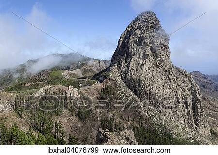 Ausblick vom Mirador Roque de Agando auf den Roque de Agando, La Gomera, Kanarische Inseln, Spanien, Europa View Large Photo Image Stock Photo - Ausblick vom Mirador Roque de Agando auf den Roque de Agando, La Gomera, Kanarische Inseln, Spanien, Europa. Fotosearch