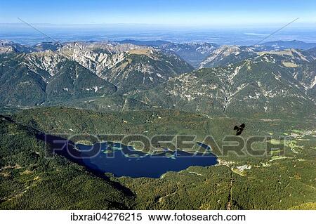 Ausblick von der Zugspitze auf den Eibsee und die Ammergauer Alpen, Grainau, Werdenfelser Land, Alpen, Oberbayern, Bayern, Deutschland, Europa View Large Photo Image Stock Photography - Ausblick von der Zugspitze auf den Eibsee und die Ammergauer Alpen, Grainau, Werdenfelser Land, Alpen, Oberbayern, Bayern, Deutschland, Europa. Fotosearch
