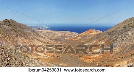Barranco la Huguera mit Blick zum Playa Quemada, Femes, Lanzarote, Kanarische Inseln, Spanien, Europa View Large Photo Image Stock Image - Barranco la Huguera mit Blick zum Playa Quemada, Femes, Lanzarote, Kanarische Inseln, Spanien, Europa. Fotosearch