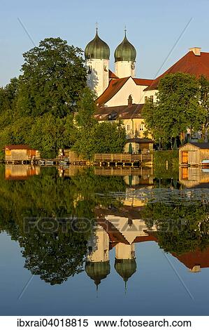 Benediktinerabtei Kloster Seeon mit Klosterkirche St. Lambert, Klostersee, Seeon-Seebruck, Chiemgau, Oberbayern, Bayern, Deutschland, Europa View Large Photo Image Stock Photography - Benediktinerabtei Kloster Seeon mit Klosterkirche St. Lambert, Klostersee, Seeon-Seebruck, Chiemgau, Oberbayern, Bayern, Deutschland, Europa. Fotosearch