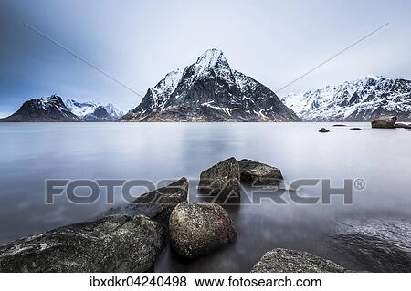 Berg Klokketinden bei Reine, Reinefjord, Moskenesoya, Lofoten, Norwegen, Europa View Large Photo Image Stock Photo - Berg Klokketinden bei Reine, Reinefjord, Moskenesoya, Lofoten, Norwegen, Europa. Fotosearch