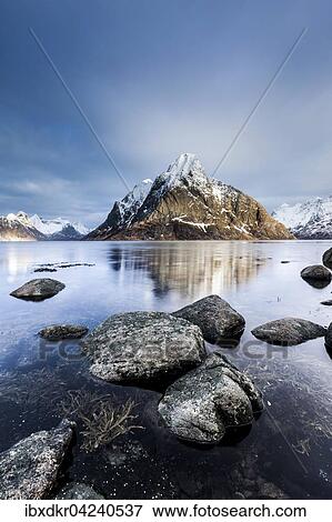 Stock Photo - Berg Klokketinden bei Reine, Reinefjord, Moskenesoya, Lofoten, Norwegen, Europa. Fotosearch
