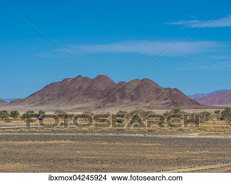 Bergrucken im Kulala Wilderness Reserve am Rand der Namib Wuste, Hardap, Namibia, Afrika View Large Photo Image Picture - Bergrucken im Kulala Wilderness Reserve am Rand der Namib Wuste, Hardap, Namibia, Afrika. Fotosearch