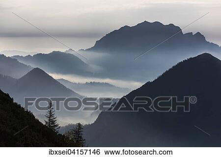 Stock Photograph - Blaue Stunde mit Bayerischen Alpen, Herzogstand, Oberbayern, Bayern, Deutschland, Europa. Fotosearch