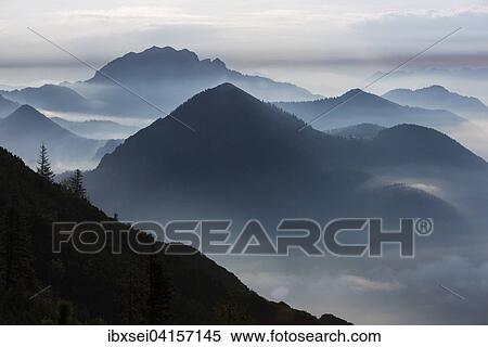 Stock Photography - Blaue Stunde mit Bayerischen Alpen, Herzogstand, Oberbayern, Bayern, Deutschland, Europa. Fotosearch