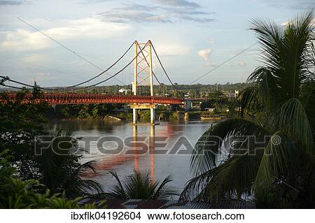 Brucke uber den Fluss Madre de Dios, Puerto Maldonado, Departamento Madre de Dios, Peru, Sudamerika View Large Photo Image Picture - Brucke uber den Fluss Madre de Dios, Puerto Maldonado, Departamento Madre de Dios, Peru, Sudamerika. Fotosearch