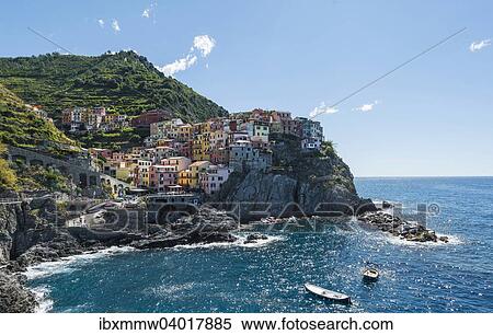 Stock Photography - Bunte Hauser an Steilkuste, Manarola, Riomaggiore, Cinque Terre, La Spezia, Ligurien, Italien, Europa. Fotosearch