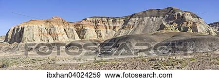 Stock Photo - Bunte Hugel im Versteinerter Wald Monumento Natural Bosques Petrificado, Sarmiento, Chubut, Argentinien, Sudamerika. Fotosearch