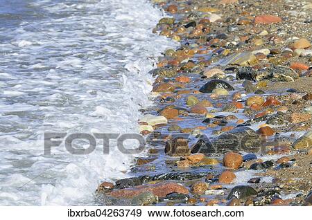 Bunte Steine am Strand, Hohes Ufer bei Ahrenshoop, Fischland-Darss-Zingst, Mecklenburg-Vorpommern, Deutschland, Europa View Large Photo Image Stock Photo - Bunte Steine am Strand, Hohes Ufer bei Ahrenshoop, Fischland-Darss-Zingst, Mecklenburg-Vorpommern, Deutschland, Europa. Fotosearch