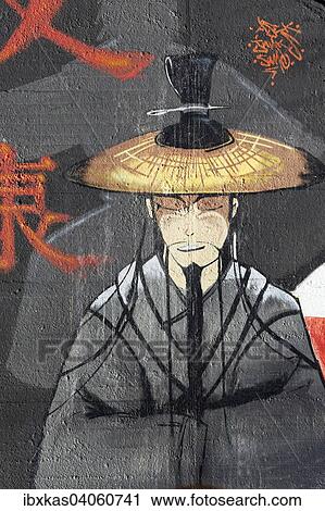 Stock Image - Chinese mit traditionellem Strohhut, Wandbild, Streetart, Duisburg, Nordrhein-Westfalen, Deutschland, Europa. Fotosearch