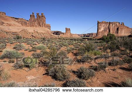 Courthouse Towers, rechts Three Gossips, Mitte Sheep Rock, links The Organ, Arches National Park, Utah, USA, Nordamerika View Large Photo Image Stock Photograph - Courthouse Towers, rechts Three Gossips, Mitte Sheep Rock, links The Organ, Arches National Park, Utah, USA, Nordamerika. Fotosearch