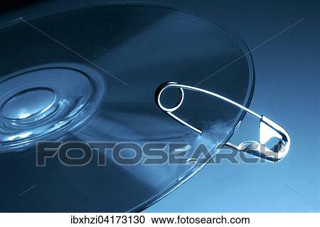 Datentrager CD ist symbolisch mit einer Sicherheitsnadel gesichert View Large Photo Image Stock Image - Datentrager CD ist symbolisch mit einer Sicherheitsnadel gesichert. Fotosearch