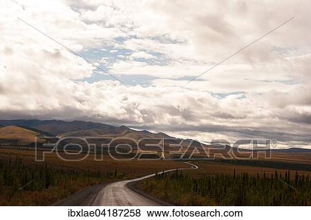 Dempster Highway unter Wolkenhimmel, McPherson, Yukon, Kanada, Nordamerika View Large Photo Image Stock Photo - Dempster Highway unter Wolkenhimmel, McPherson, Yukon, Kanada, Nordamerika. Fotosearch
