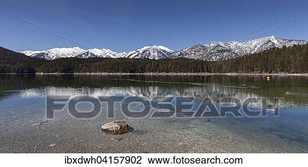 Stock Image - Der Eibsee vor den Bayerischen Alpen, Grainau, Oberbayern, Bayern, Deutschland, Europa. Fotosearch