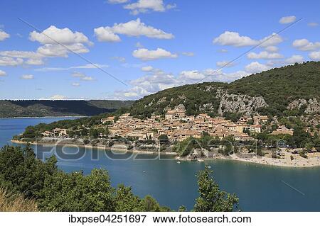 Dorf Bauduen am Ufer des Lac de Sainte-Croix westlich der Gorges du Verdon, Provence, Departement Var, Frankreich, Europa View Large Photo Image Stock Photo - Dorf Bauduen am Ufer des Lac de Sainte-Croix westlich der Gorges du Verdon, Provence, Departement Var, Frankreich, Europa. Fotosearch