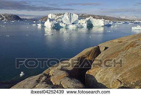 Ein Eisberg treibt im Johan Petersen Fjord, Kalaallit Nunaat, Ostgronland, Gronland, Nordamerika View Large Photo Image Stock Photo - Ein Eisberg treibt im Johan Petersen Fjord, Kalaallit Nunaat, Ostgronland, Gronland, Nordamerika. Fotosearch