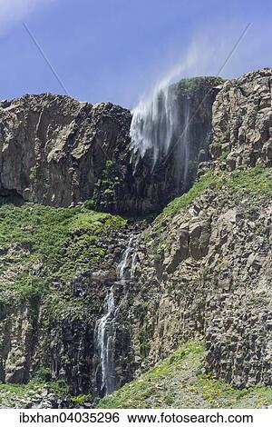 Ein kleiner Wasserfall wird vom Sturm verblasen, Saltos de Arco Iris, Maule-Tal, San Clemente, Region del Maule, Chile, Sudamerika View Large Photo Image Stock Photograph - Ein kleiner Wasserfall wird vom Sturm verblasen, Saltos de Arco Iris, Maule-Tal, San Clemente, Region del Maule, Chile, Sudamerika. Fotosearch