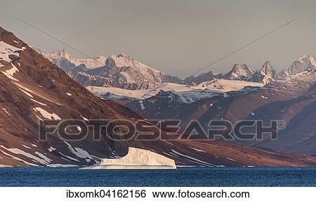 Eisberg, Berge im Morgenlicht, Kong Oscar Fjord, Nordost-Gronland-Nationalpark, Gronland, Nordamerika View Large Photo Image Stock Photograph - Eisberg, Berge im Morgenlicht, Kong Oscar Fjord, Nordost-Gronland-Nationalpark, Gronland, Nordamerika. Fotosearch