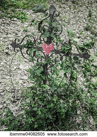 Eisenkreuz mit rotem Herz, Grab auf einem Friedhof, Frankreich, Europa View Large Photo Image Stock Photography - Eisenkreuz mit rotem Herz, Grab auf einem Friedhof, Frankreich, Europa. Fotosearch