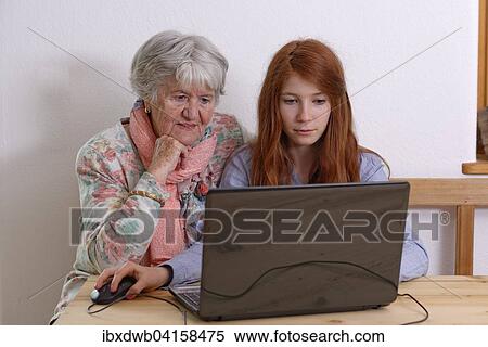 Enkelin und Grossmutter am Laptop, Bayern, Deutschland, Europa View Large Photo Image Stock Photography - Enkelin und Grossmutter am Laptop, Bayern, Deutschland, Europa. Fotosearch