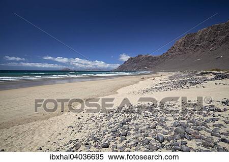 Famara Strand, Playa de Famara, mit Risco de Famara, Lanzarote, Kanarische Inseln, Spanien, Europa View Large Photo Image Stock Photography - Famara Strand, Playa de Famara, mit Risco de Famara, Lanzarote, Kanarische Inseln, Spanien, Europa. Fotosearch