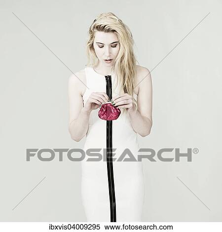Frau in weissem Kleid und mit roter Handtasche View Large Photo Image Stock Photography - Frau in weissem Kleid und mit roter Handtasche. Fotosearch