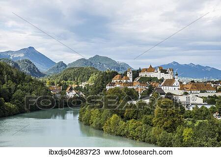 Fussen mit Lech vor Allgauer Alpen, Schwangau, Allgau, Oberbayern, Bayern, Deutschland, Europa View Large Photo Image Stock Image - Fussen mit Lech vor Allgauer Alpen, Schwangau, Allgau, Oberbayern, Bayern, Deutschland, Europa. Fotosearch