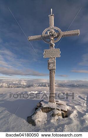 Gipfelkreuz auf der Sonnenspitze, Inntal, Tirol, Osterreich, Europa View Large Photo Image Stock Image - Gipfelkreuz auf der Sonnenspitze, Inntal, Tirol, Osterreich, Europa. Fotosearch