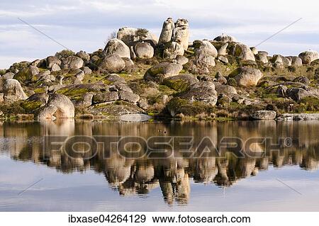 Stock Photo - Granitfelsen mit Storchennestern, Weissstorche (Ciconia ciconia), Naturschutzgebiet Los Barruecos, Extremadura, Spanien, Europa. Fotosearch