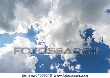 Grosse weisse Wolken vor blauem Himmel View Large Photo Image Stock Photograph - Grosse weisse Wolken vor blauem Himmel. Fotosearch