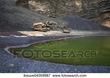 Grune Lagune, Lago Verde, durch Algen grun gefarbter Vulkansee am Lavastrand, Charco de los Clicos, Kraterkessel von El Golfo, Vulkanlandschaft, Lanzarote, Kanarische Inseln, Spanien, Europa View Large Photo Image Stock Photo - Grune Lagune, Lago Verde, durch Algen grun gefarbter Vulkansee am Lavastrand, Charco de los Clicos, Kraterkessel von El Golfo, Vulkanlandschaft, Lanzarote, Kanarische Inseln, Spanien, Europa. Fotosearch