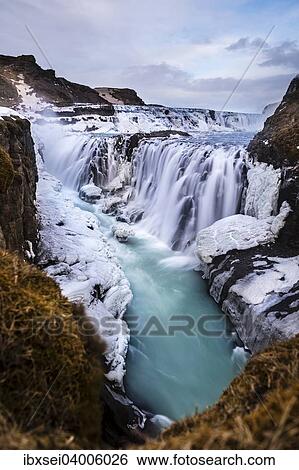 Gullfoss Wasserfall, mit Eis und Steinen, Vik, Island, Europa View Large Photo Image Stock Photograph - Gullfoss Wasserfall, mit Eis und Steinen, Vik, Island, Europa. Fotosearch