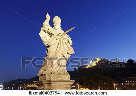 Heiligenfigur Heiliger Kilian auf der alten Mainbrucke, hinten die Festung Marienberg, Wurzburg, Unterfranken, Bayern, Deutschland, Europa View Large Photo Image Stock Image - Heiligenfigur Heiliger Kilian auf der alten Mainbrucke, hinten die Festung Marienberg, Wurzburg, Unterfranken, Bayern, Deutschland, Europa. Fotosearch