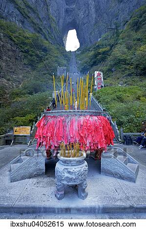 Stock Photography - Himmelstor mit Gebetsfahnen im Vordergrund, Tianmen-Hohle, grosste durch Wasser erodierte Hohle der Welt, Tianmen-Nationalpark, Provinz Hunan, China, Asien. Fotosearch