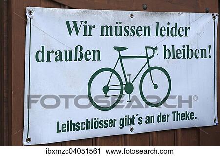 Hinweisschild fur Radfahrer vor einem Gartenlokal, Wir mussen leider draussen bleiben, Regensburg, Oberpfalz, Bayern, Deutschland, Europa View Large Photo Image Stock Image - Hinweisschild fur Radfahrer vor einem Gartenlokal, Wir mussen leider draussen bleiben, Regensburg, Oberpfalz, Bayern, Deutschland, Europa. Fotosearch