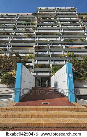 Hochhaus mit begrunten Balkonen, ehemaliges Olympiadorf, Munchen, Bayern, Deutschland, Europa View Large Photo Image Stock Photography - Hochhaus mit begrunten Balkonen, ehemaliges Olympiadorf, Munchen, Bayern, Deutschland, Europa. Fotosearch