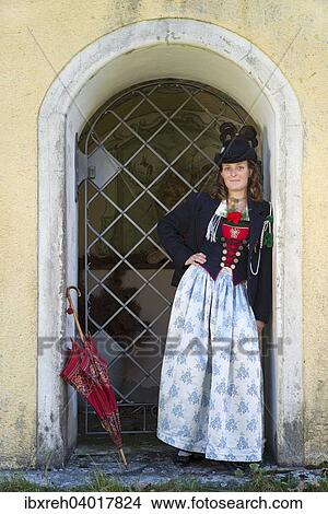 Junge Frau in Tracht, fur die Region Achensee typische Tiroler Tracht, Achenkirch am Achensee, Tirol, Osterreich, Europa View Large Photo Image Picture - Junge Frau in Tracht, fur die Region Achensee typische Tiroler Tracht, Achenkirch am Achensee, Tirol, Osterreich, Europa. Fotosearch