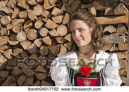 Junge Frau in Tracht, fur die Region Achensee typische Tiroler Tracht, Achenkirch am Achensee, Tirol, Osterreich, Europa View Large Photo Image Stock Image - Junge Frau in Tracht, fur die Region Achensee typische Tiroler Tracht, Achenkirch am Achensee, Tirol, Osterreich, Europa. Fotosearch