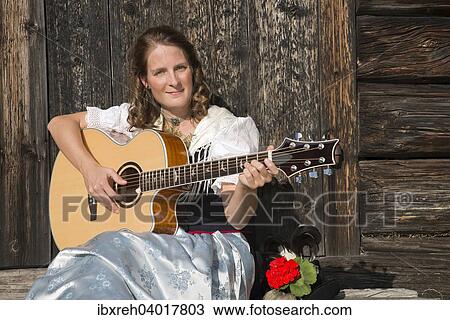 Junge Frau in Tracht, fur die Region Achensee typische Tiroler Tracht, Achenkirch am Achensee, Tirol, Osterreich, Europa View Large Photo Image Stock Image - Junge Frau in Tracht, fur die Region Achensee typische Tiroler Tracht, Achenkirch am Achensee, Tirol, Osterreich, Europa. Fotosearch