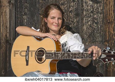 Junge Frau in Tracht, fur die Region Achensee typische Tiroler Tracht, Achenkirch am Achensee, Tirol, Osterreich, Europa View Large Photo Image Stock Image - Junge Frau in Tracht, fur die Region Achensee typische Tiroler Tracht, Achenkirch am Achensee, Tirol, Osterreich, Europa. Fotosearch