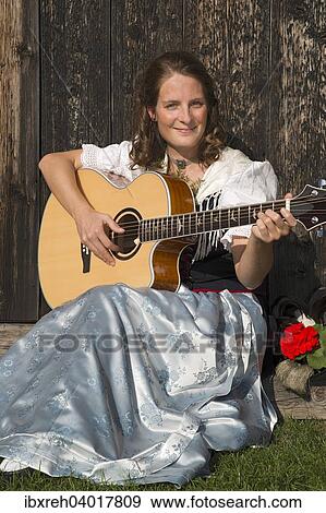 Junge Frau in Tracht, fur die Region Achensee typische Tiroler Tracht, Achenkirch am Achensee, Tirol, Osterreich, Europa View Large Photo Image Stock Photo - Junge Frau in Tracht, fur die Region Achensee typische Tiroler Tracht, Achenkirch am Achensee, Tirol, Osterreich, Europa. Fotosearch